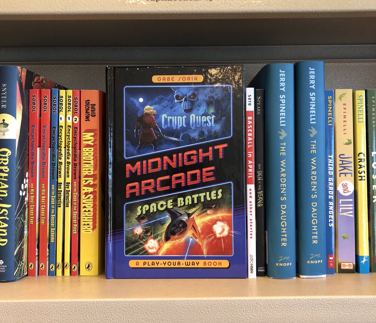 karljones's tweet photo. Happy Book Birthday to @Bitchinville and #midnightarcade. Photo from the bookstore jungle by @underananchor! What. Do. You. Do? #playyourway #edwardpackard #RAMontgomery #joelledelbourgo #cryptquest #spacebattles https://t.co/dImObuJOcy
