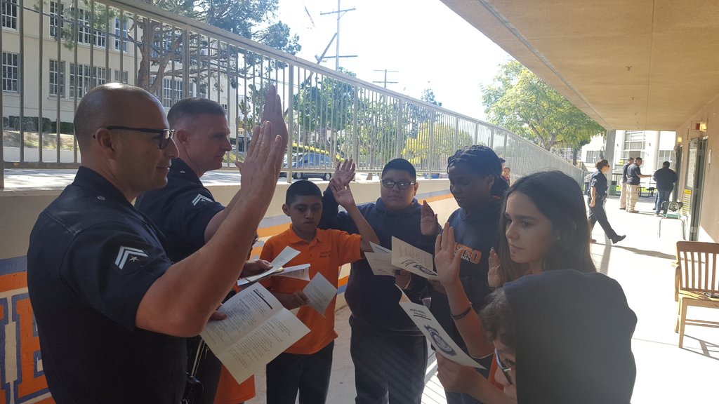 LAPDHQ's tweet photo. #LAPD officers switched roles today with students to establish positive lines of communication. Providing officers an opportunity to discuss and address negative perceptions and stereotypes. #Roleplaying https://t.co/u1HTIZUvqO