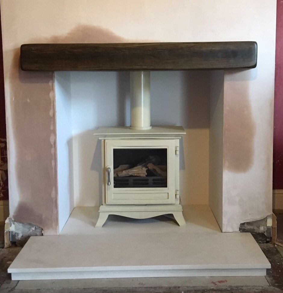 Recent installation of the very popular @ChesneysLtd Beaumont #gas #stove in parchment with #fauxoakbeam and #limestonehearth.
#homeimprovement #rusticdecor #efficientheating #interiordesign