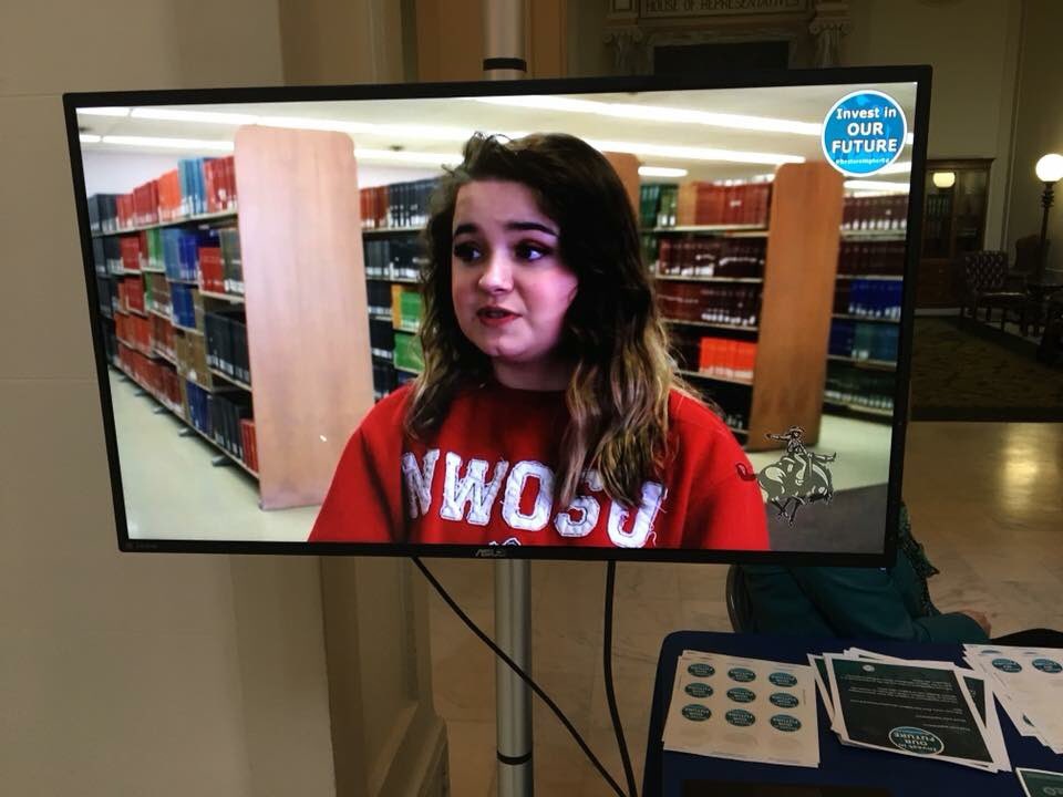 Shelby Bender, Cherokee junior, is on the video board at the State Capitol talking about the benefits of concurrent enrollment. Northwestern students are at the Capitol for Higher Education Day. #RestoreHigherEd