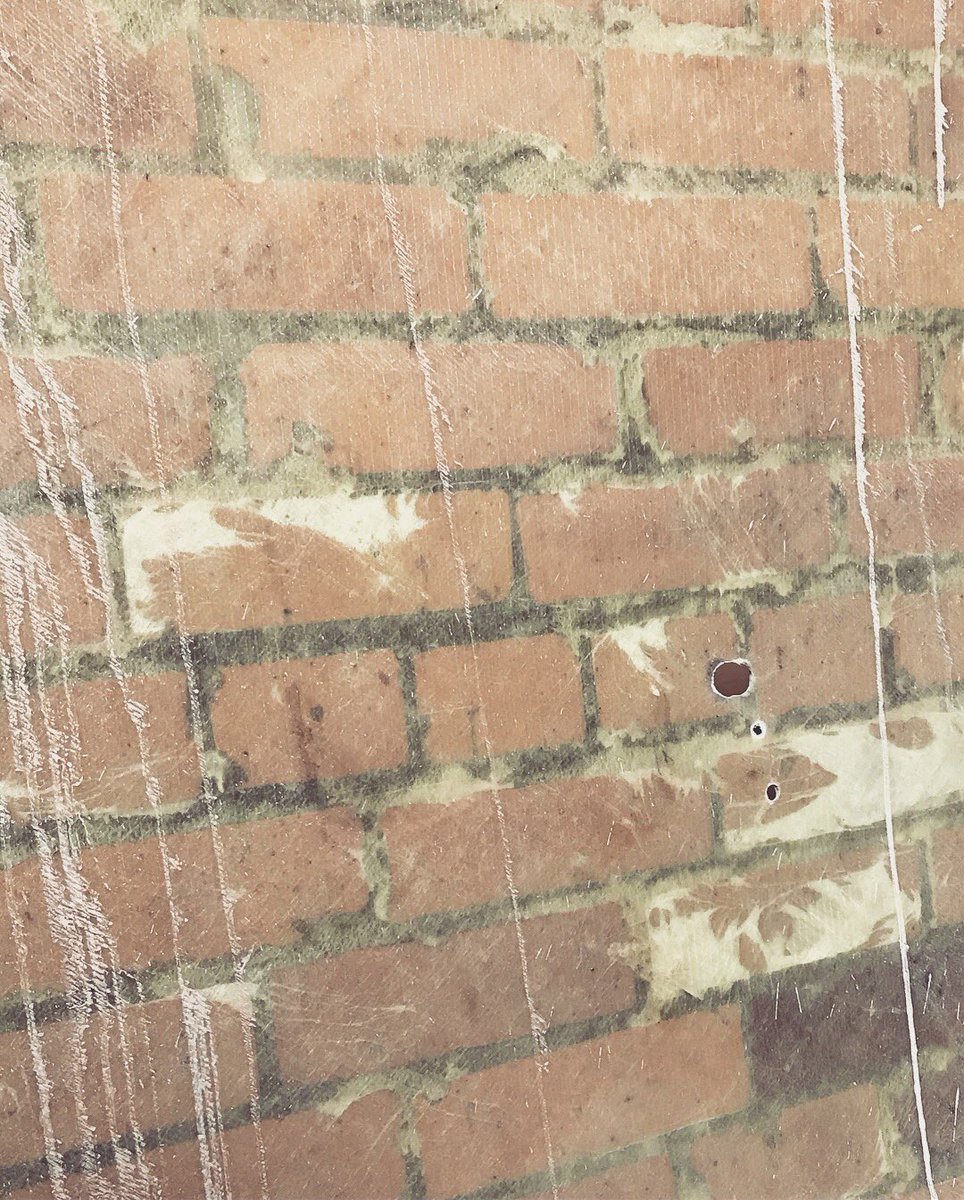What do you get when you remove fiberglass from historic brick? A sheet of brick and mortar. Work on our office expansion is underway! #ffkrarchitects #officeexpansion