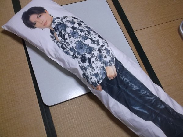 srsly, how many body pillows does this man need???