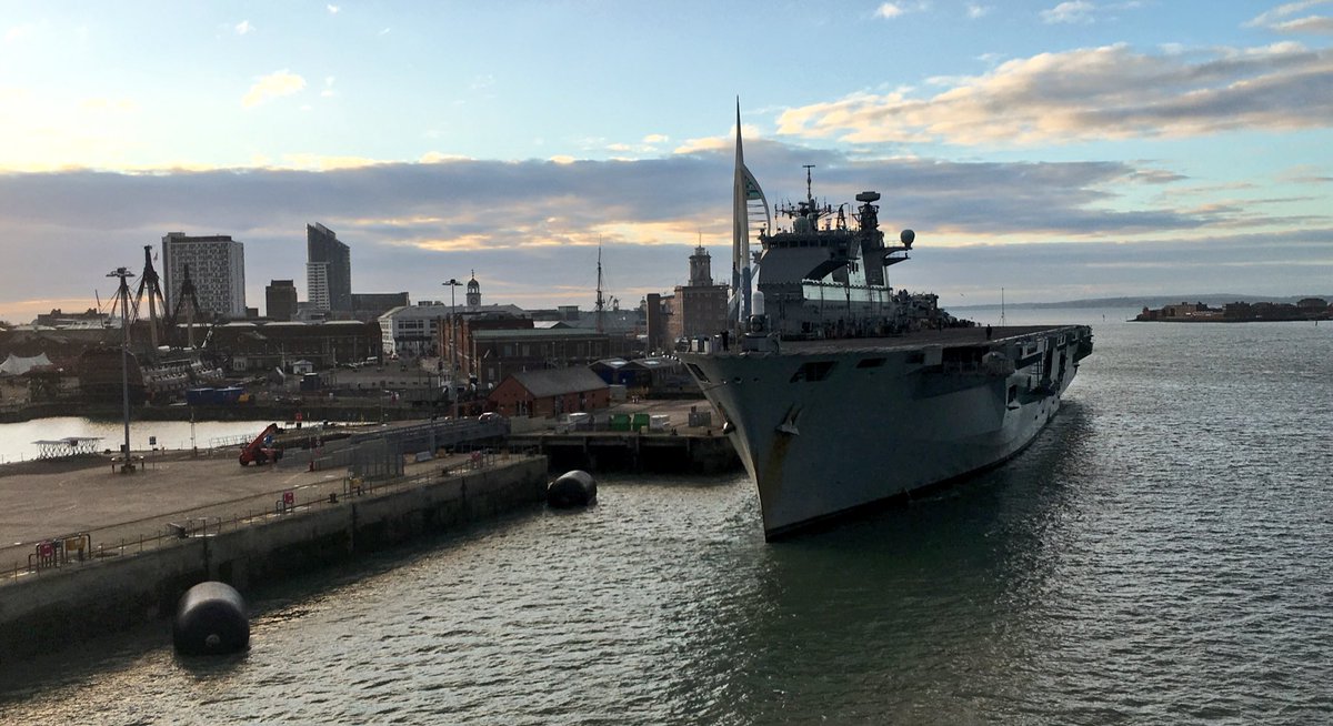 HMS Ocean is alongside HMNB Portsmouth and is berthed astern of us.