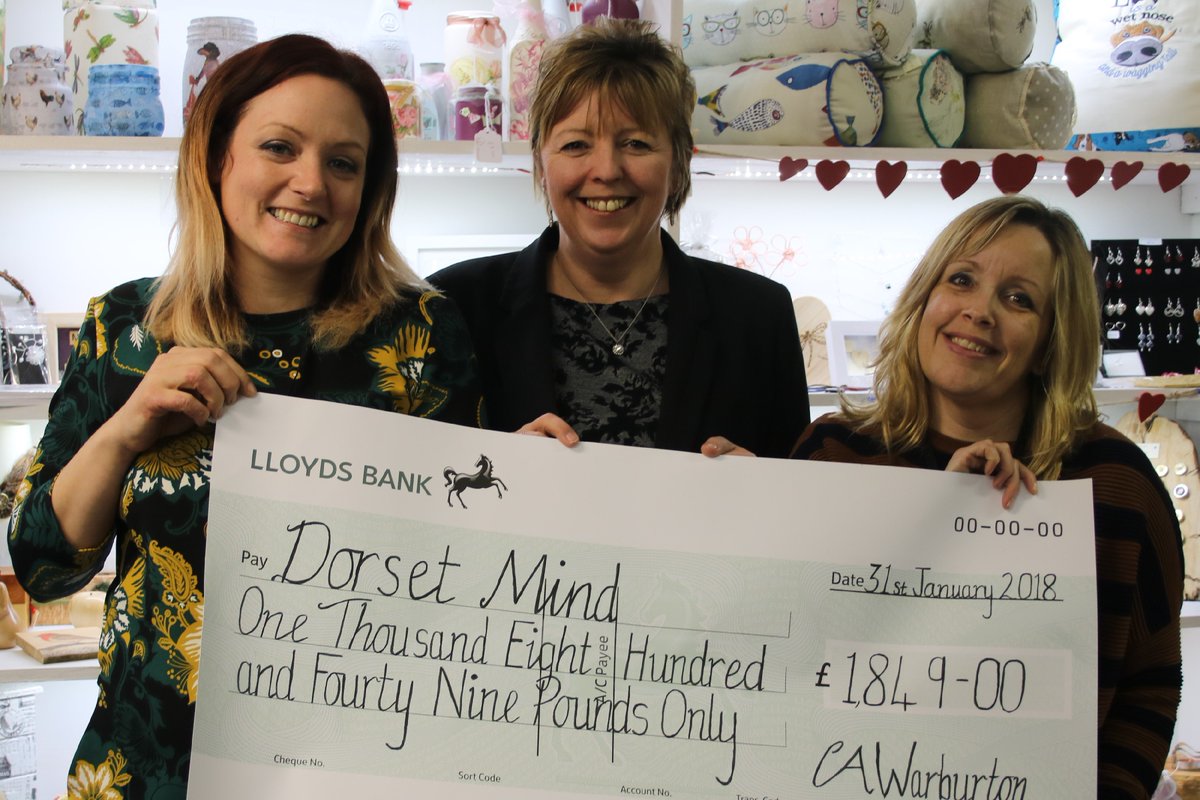 Louise &amp; Dee accepting a cheque from Cheryl &amp; her generous traders <a href="/chezzawar/">Crafty Gift Boutique</a> on behalf of <a href="/DorsetMind/">Dorset Mind</a> to help the ongoing plan to expand!