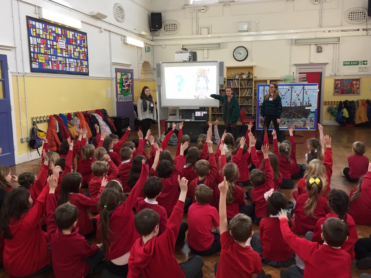 SouthvillePri's tweet photo. Dr Ann Alston, senior lecturer in English literature and her students doing an assembly about Roald Dahl and his characters. They are back on Wednesday (Dress up like a Roald Dahl character day) to work with each class on exploring the characters in more depth. @uweEnglish https://t.co/foQGwv3X1m