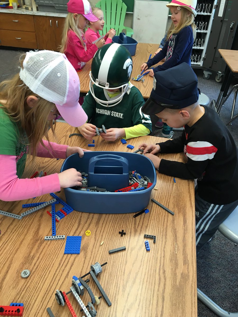 mrlosik's tweet image. Is that @KirkCousins8 over there engineering with us today in STEM...or is it @drewstanton ? #hatday