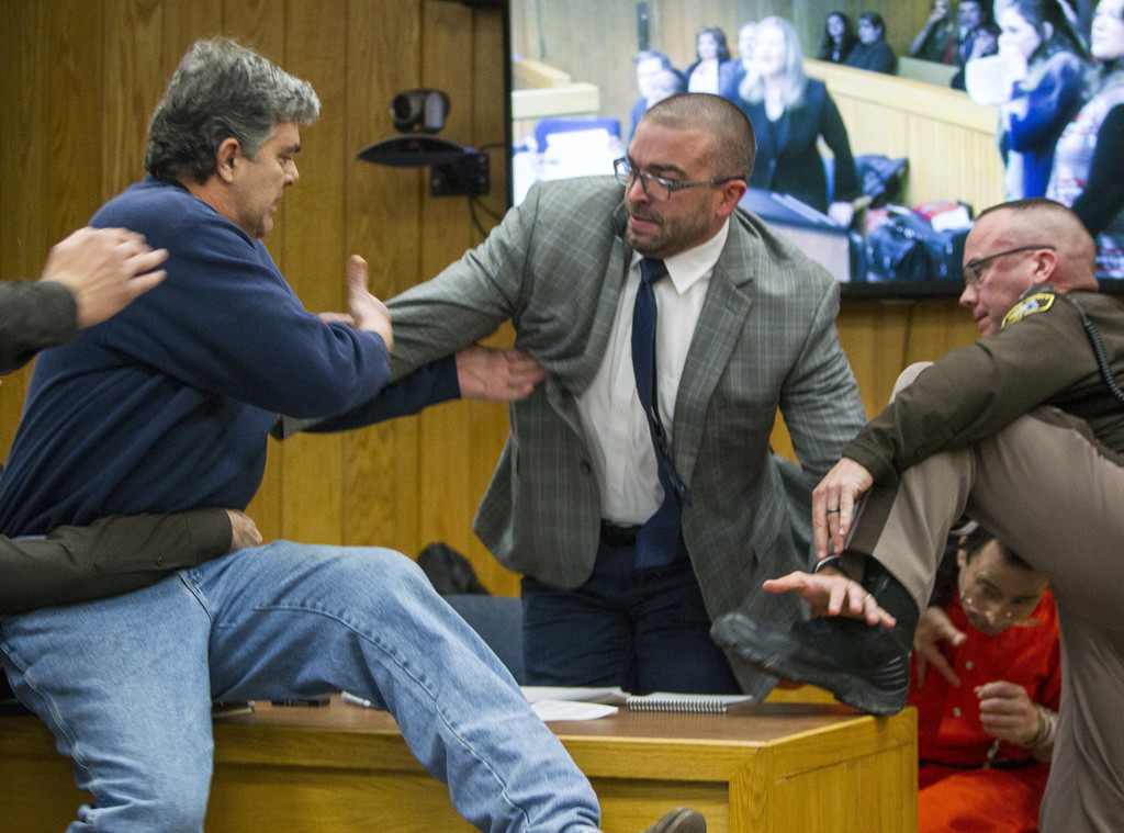 enews's tweet photo. The father of three daughters who were sexually abused by Larry Nassar tried to attack him at his final sentencing hearing after a judge refused his request to be put into a locked room with him. https://t.co/YVGGaAr0Ws https://t.co/viRaz4QnPd