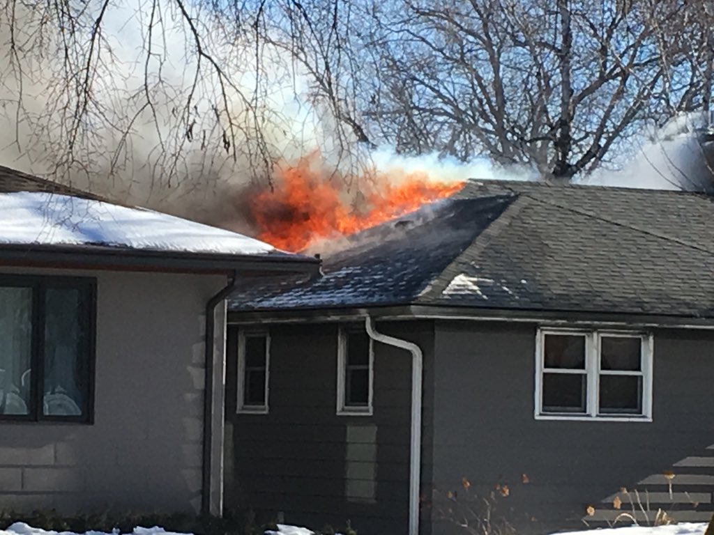 New Ulm FD fighting blaze at 209 S State.