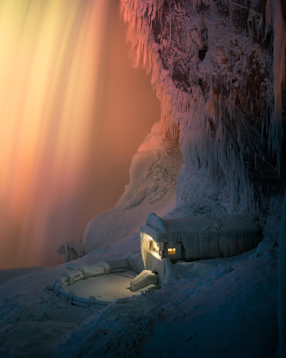thisiscolossal's tweet photo. An Illuminated Niagara Falls Captured in a January Freeze by Adam Klekotka https://t.co/bHJEuvKO7W https://t.co/WbngR8MHo3