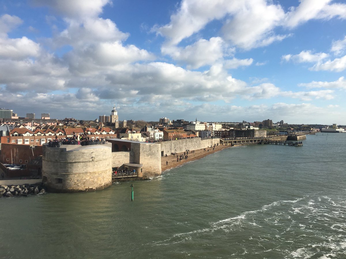 People waving the ship out on top of Round Tower.