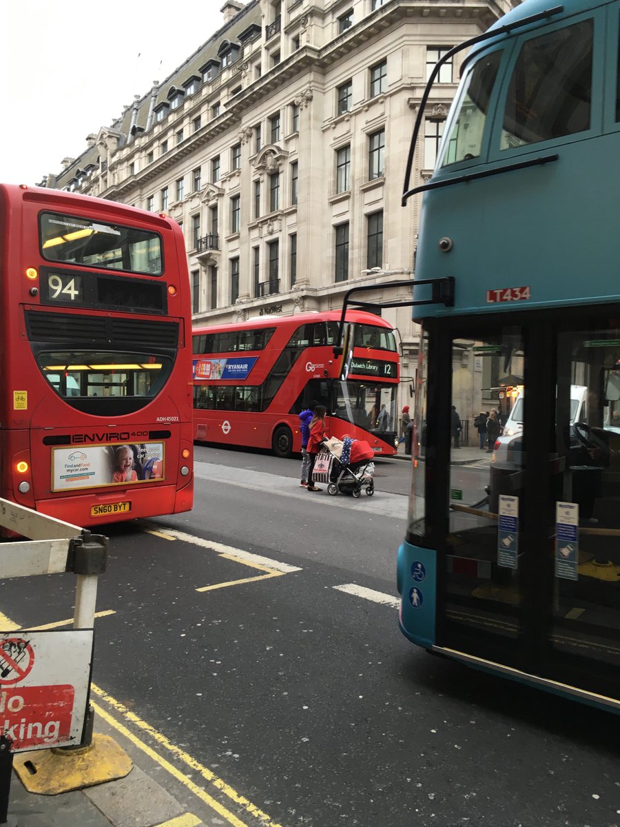 comadad's tweet photo. This picture of a family trapped in a 'Pedestrian Refuge' on Regent Street today captures the #Lethal Pedestrian Conditions in London's 'Premier Shopping Destination'! Dozens of #EmptyBuses, Crowded Pavements, no #TimeToCross @livingstreets @CarolineRussell @V0LDN @paulgannonbike https://t.co/UGE18YYrU9