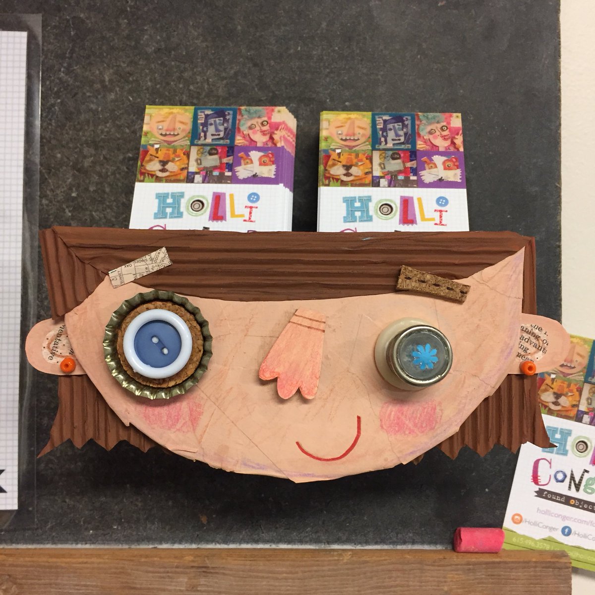 HOLLiCONGER's tweet photo. My little self-portrait business card noggin’ for my new space at North Trade Street Arts I’m excited to have a more permanent gallery space there for my found object art and be a part of the first of many @DADAWS tonight. #wsnc #wsncart #ncartist #foundobjectart #dadaws https://t.co/rzH460fyc8