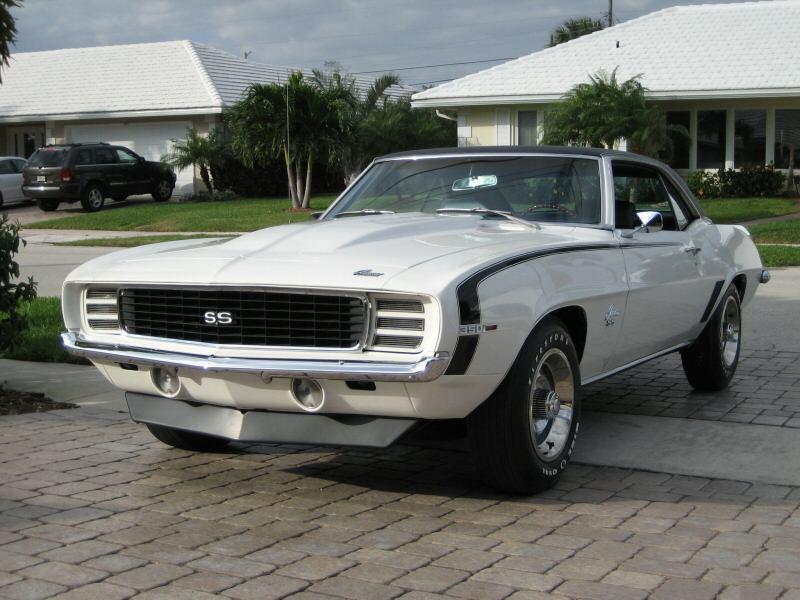 CorieHaynes's tweet photo. .@ESPNMcGee #MyFirstCarWas A 1969 Camaro RS/SS with hideaway headlights. All original, white with black vinyl top. Much like this photo. I have actual pics somewhere. LOVED that car. Stolen off the school parking lot when I was a senior in high school. https://t.co/cpAKTiRkdH