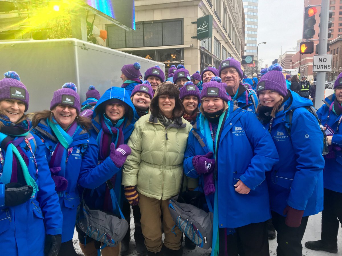 amyklobuchar's tweet photo. Great MN volunteers on the Nicollet Mall for the Super Bowl. That’s me in the hat with the ear flaps. #BoldNorth https://t.co/RfoVPcGCGL