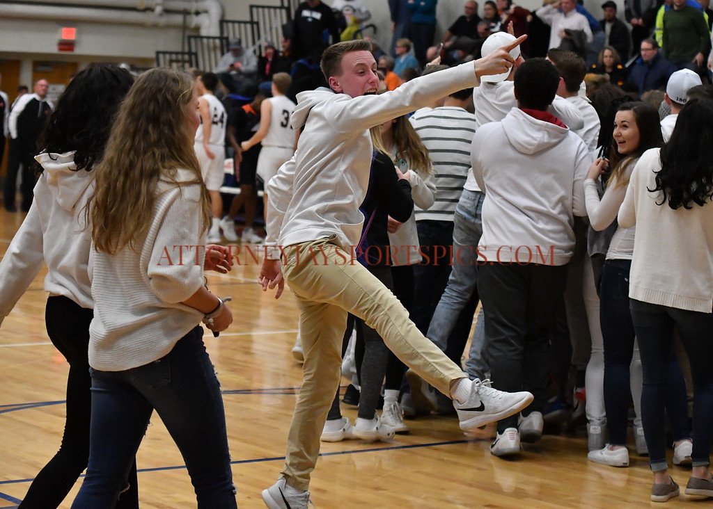 Attorney_Jay's tweet photo. Colonials jubilant after defeating Northeastern. https://t.co/JYlNN89W84