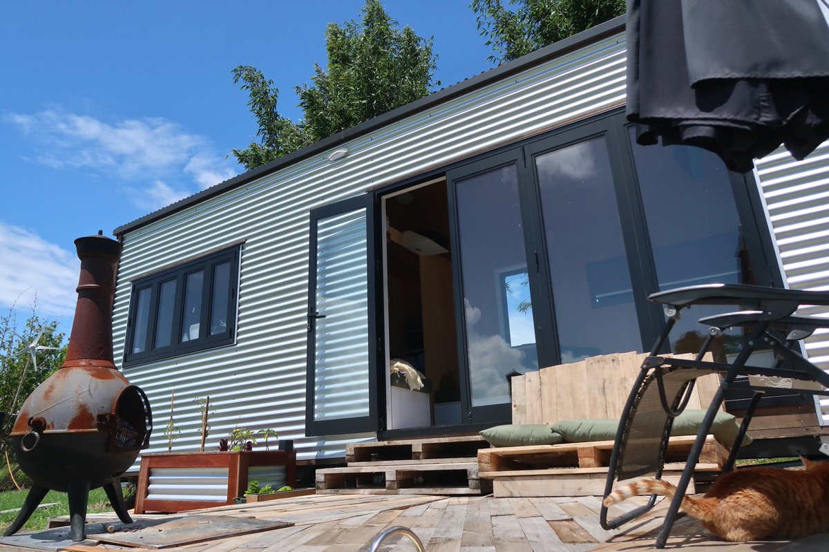 THLinNZ's tweet photo. The four seasons today meant we collected rain water, got a good dose of solar and had the turbine cranking! 🌞🍂💧#tinyhouse #Auckland https://t.co/oy7nnIQx3Y