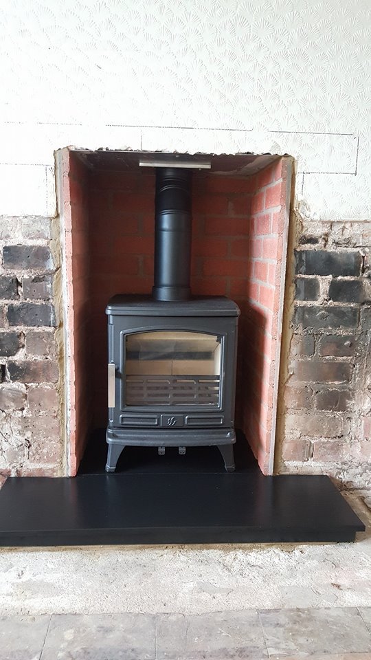 One of our recent fits a @ACRHeat Oakdale 5kw multifuel stove with brick inserts supplied by @percydoughty  and hearth supplird by Caterham Marble &amp; Granite