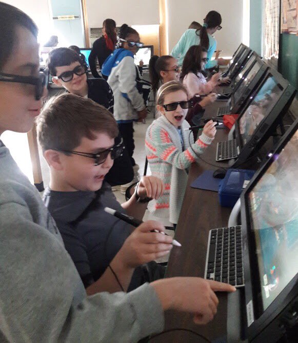polk_street's tweet photo. 4th graders enjoying zSpace in the STEM lab! #pss #pssstem https://t.co/d5FWOtw7Sa