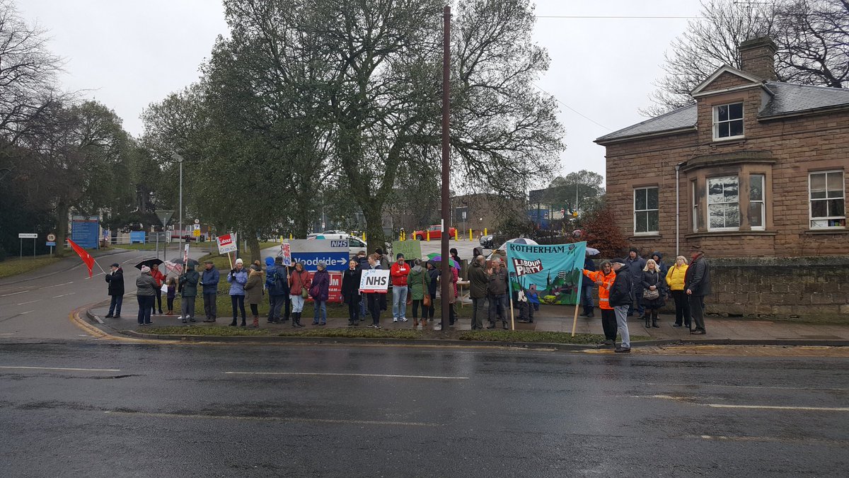 RothLabourWomen's tweet photo. Brilliant turnout from
 @LabourRotherham &amp; Rotherham @PeoplesMomentum. massive spport at our Rotherham #nhsdemo. We even had ambulances waving &amp; beeping their support. #OurNHS #SaveOurNHS. Big thanks to @SarahChampionMP for joining us in the rain too! #NHSCrisis  #FundOurNHS https://t.co/VWb7VdwgNw