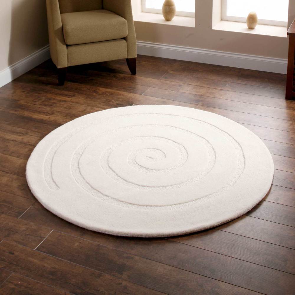 therugseller's tweet photo. A handmade and hand-carved contemporary spiral design https://t.co/YSNCwCXieI #CircularRug https://t.co/x4NQ9QtUGg