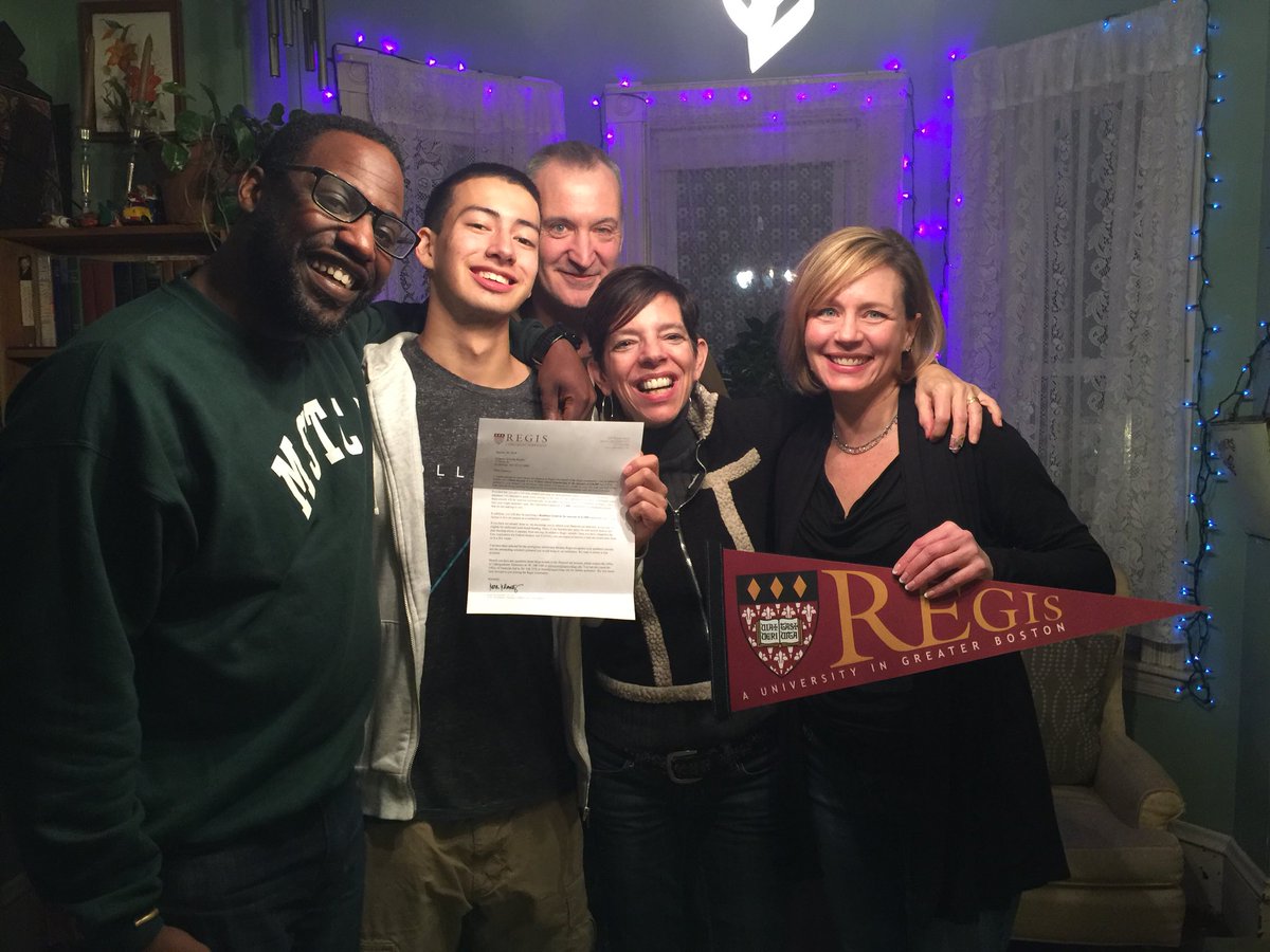 RegisAdmission's tweet photo. A #PridePost surprise delivery last evening with Vice President Sutherland of @RegisGradSchool - Congratulations! #Regis2022 https://t.co/Qn10notkii