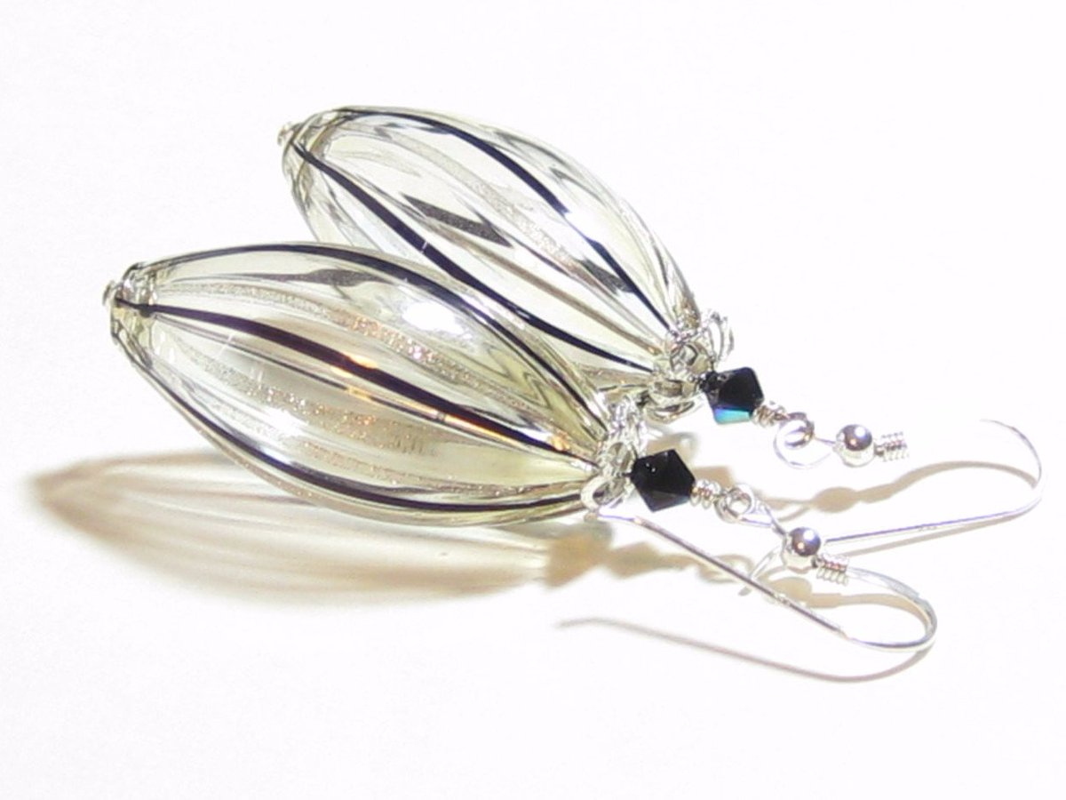 JKCMurano's tweet photo. Murano Blown Glass Clear Black Copper Long Oval Earrings https://t.co/vxj8dWXX5G #craftshout #giftsforher https://t.co/thmpDqGs1v