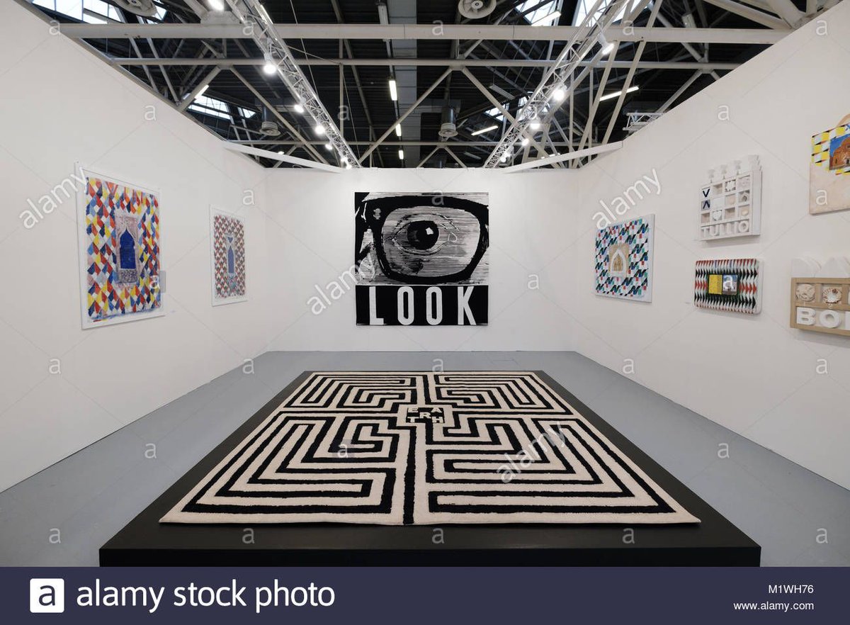 Paintings is displayed at the @ArteFiera. #ArteFiera is an international contemporary art fair held annually in #Bologna which has reached the 42th Edition this year. Credit: <a href="/maxdonati/">Max Donati</a> buff.ly/2E0wwuU