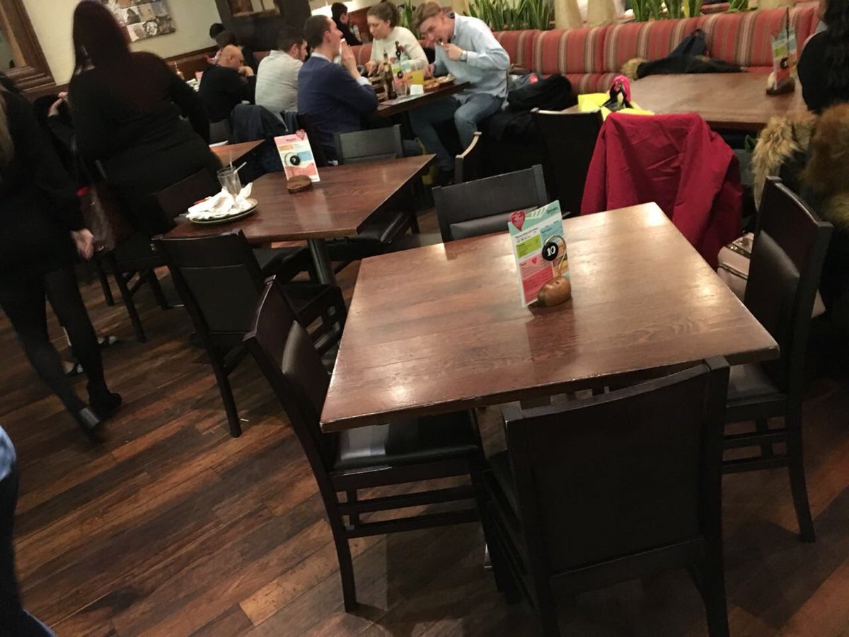scottdashot's tweet photo. @NandosUK can’t believe your Mailbox Birmingham branch can’t put these 2 tables together for “health &amp; safety” reasons #awfulcustomerservice https://t.co/KCLx37guqj