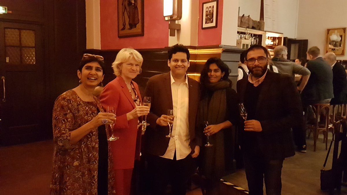 Double champagne toast in #Berlin to #ChaitanyaTamhane for his @Rolex Mentor-Protege prog with @alfonsocuaron ('Gravity'), and fr #Balekempa dir by #EreGowda,  winning @FIPRESCI award @IFFR. Film prod by #VivekGomber backed by #Tamhane (photo) w #DorotheeWenner, #PoojaTalreja, me