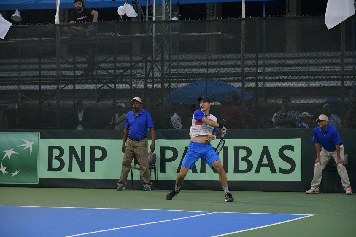 DiarioLibre's tweet photo. #CopaDavis2018: José (Bebo) Hernández ganó el segundo set a Thiago Monteiro 7-6. Con esta victoria Dominicana empata la serie 2-2 contra Brasil y se decidirá este sábado en un tercer partido. https://t.co/E81aDLvBNS