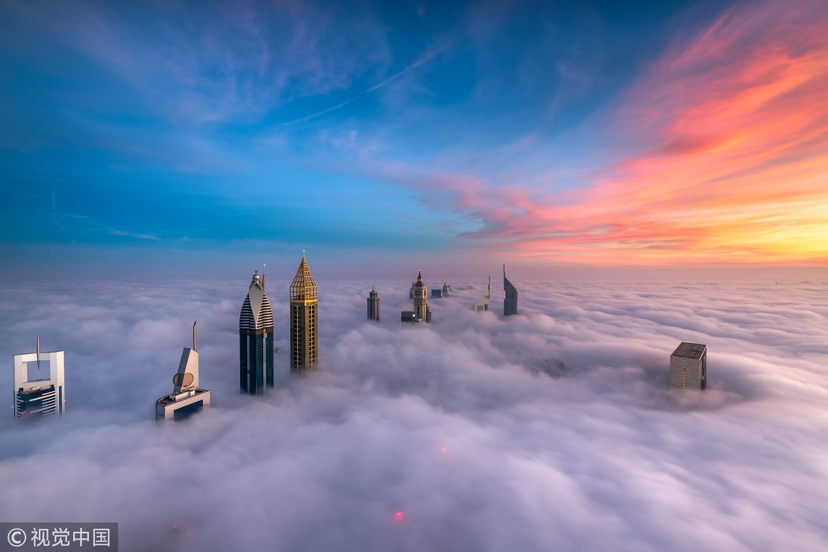CGTNOfficial's tweet photo. Photographer Zohaib Anjum captures stunning images of #Dubai’s skyscrapers from above the clouds https://t.co/lFNf90lgjl