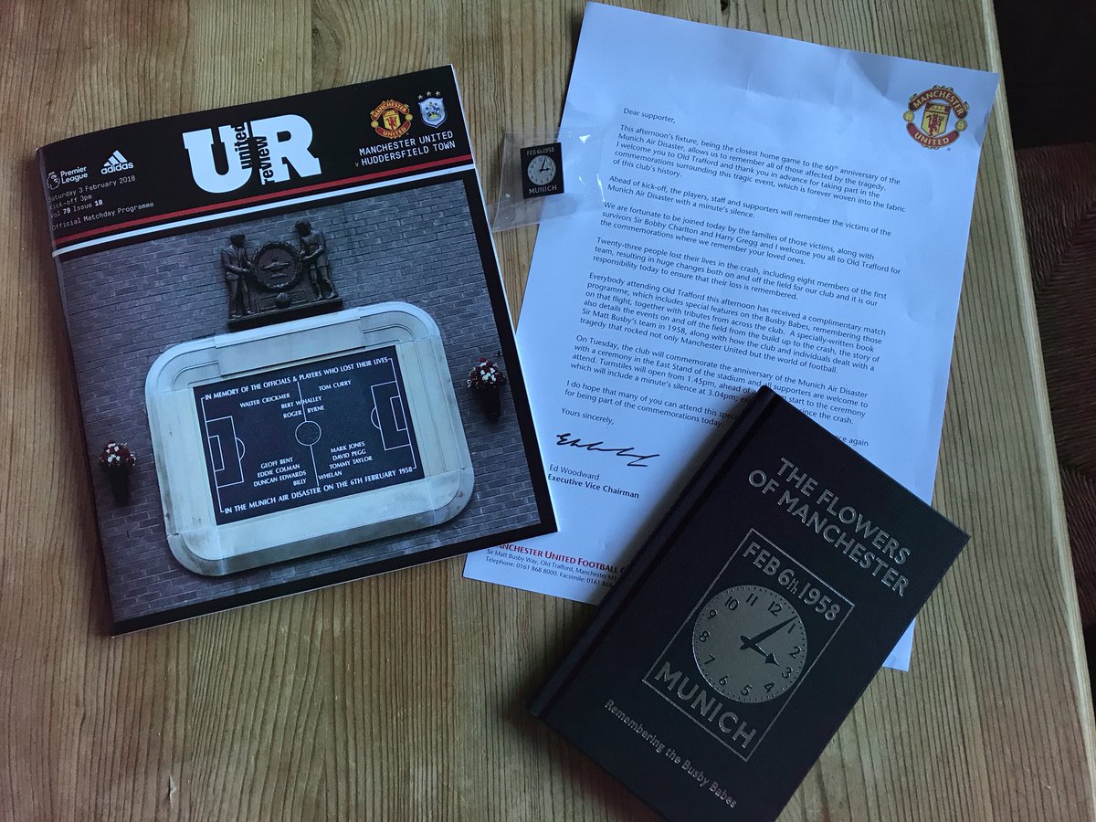 Nice touch from MUFC to give every fan at the game a programme, book and badge.