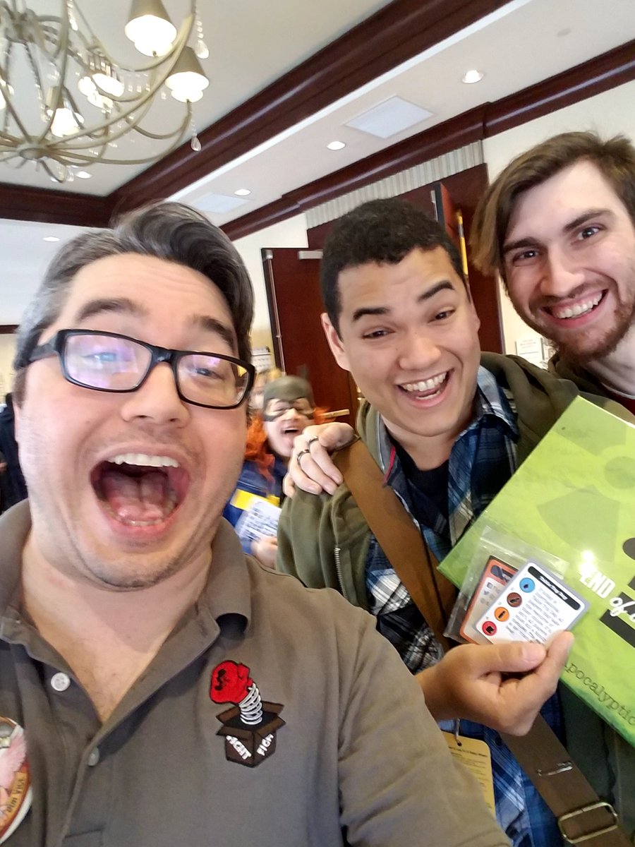 fightinabox's tweet photo. We sold out of EotL again! These are the lucky fellas who got the last copy. #CaptainCon2018 https://t.co/49FZZhFYun