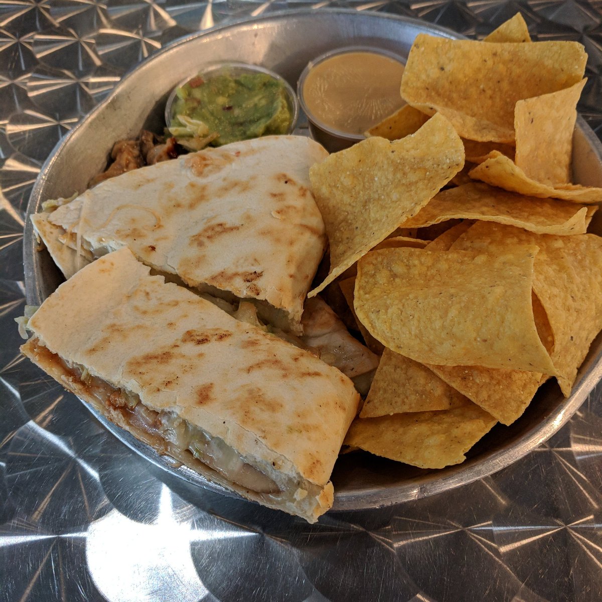 NEOBURRITOAVL's tweet photo. You can't keep a good quesadilla down! Neo locations will be open regular hours today, but if the weather turns please feel free to call and double check! #neoburrito #avleats #avl #comeonspring https://t.co/8gAyKNfYuK