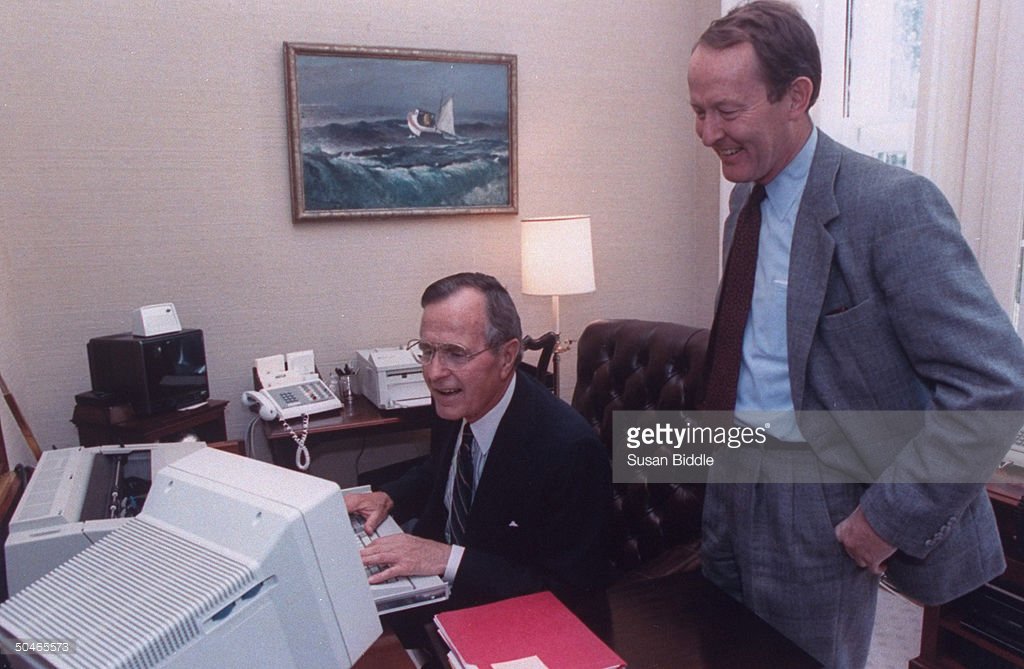 President George H. W. Bush using a computer in '91.