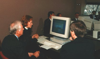 Here's Jimmy Carter in 1995 being told about ideas for a computerized Presidental Library, on a Sparc-20.