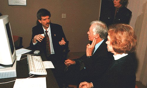 Here's Jimmy Carter in 1995 being told about ideas for a computerized Presidental Library, on a Sparc-20.