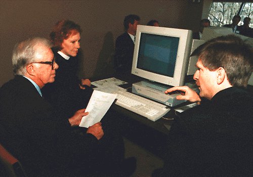 Here's Jimmy Carter in 1995 being told about ideas for a computerized Presidental Library, on a Sparc-20.