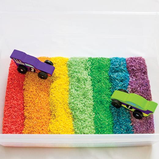 ASHAleader's tweet photo. Colorful sensory tray as a fun way to target core word “in” using focused language stimulation. You can ask questions, direct play, make comments, request &amp; protest. For example, “The cars are in the box.” “Where’s the car? In the box!” “Go in!”  https://t.co/MQSoLEoUSu https://t.co/1x0PWWEJcG
