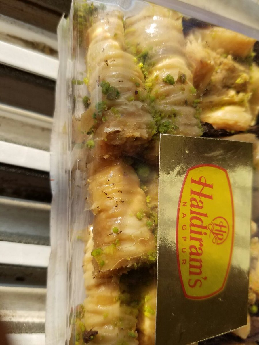 ojasdoshi's tweet photo. I have found ants in a seal packed baklava bought from Nagpur Haldiram outlet (Company owned outlet not a franchisee)
I contacted them but it seems they don't care. So I am resorting to this. @NagpurHaldirams @haldiramfoods @Haldiramsonline https://t.co/jxKUzqBfJM
