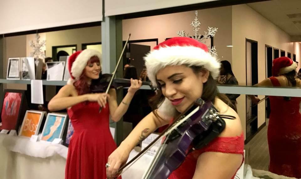 Image result for violinist at christmas party