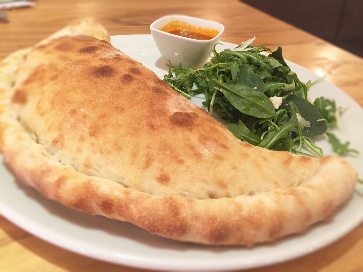 stradatweet's tweet image. A new month brings a new #PizzaMondays special... enjoy our Calzone Di Carne Piccante, filled with Pork &amp;amp; Beef Ragù, spicy 'Nduja, Salami Piccante &amp;amp; Mozzarella, served with a mixed leaf &amp;amp; parmesan salad + a pot of spicy tomato sauce (for dipping!). Just £5 today!