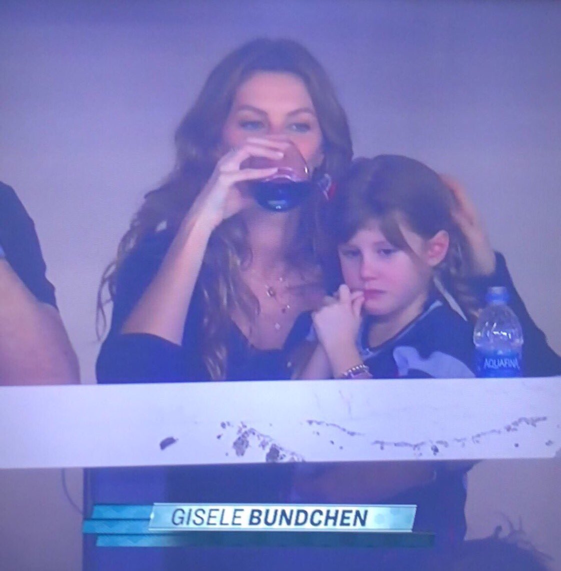 fox2deena's tweet photo. Finally, we moms share something in common with Gisele! Consoling a child with one hand, glass of wine in the other! #TheNine https://t.co/ngXXi6g54v