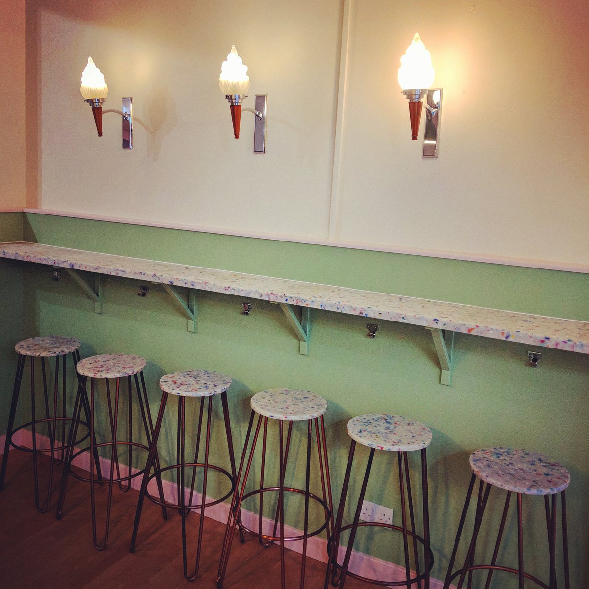 marysmilkbar's tweet photo. The New Milk Bar. All made from recycled milk bottles and their different coloured tops - there's even some of our very own used milk bottles in there. 1170 bottles/40kg of recycled plastic went in to making this beautiful, new Milk (Bottle) Bar. https://t.co/QgD41v9cSK