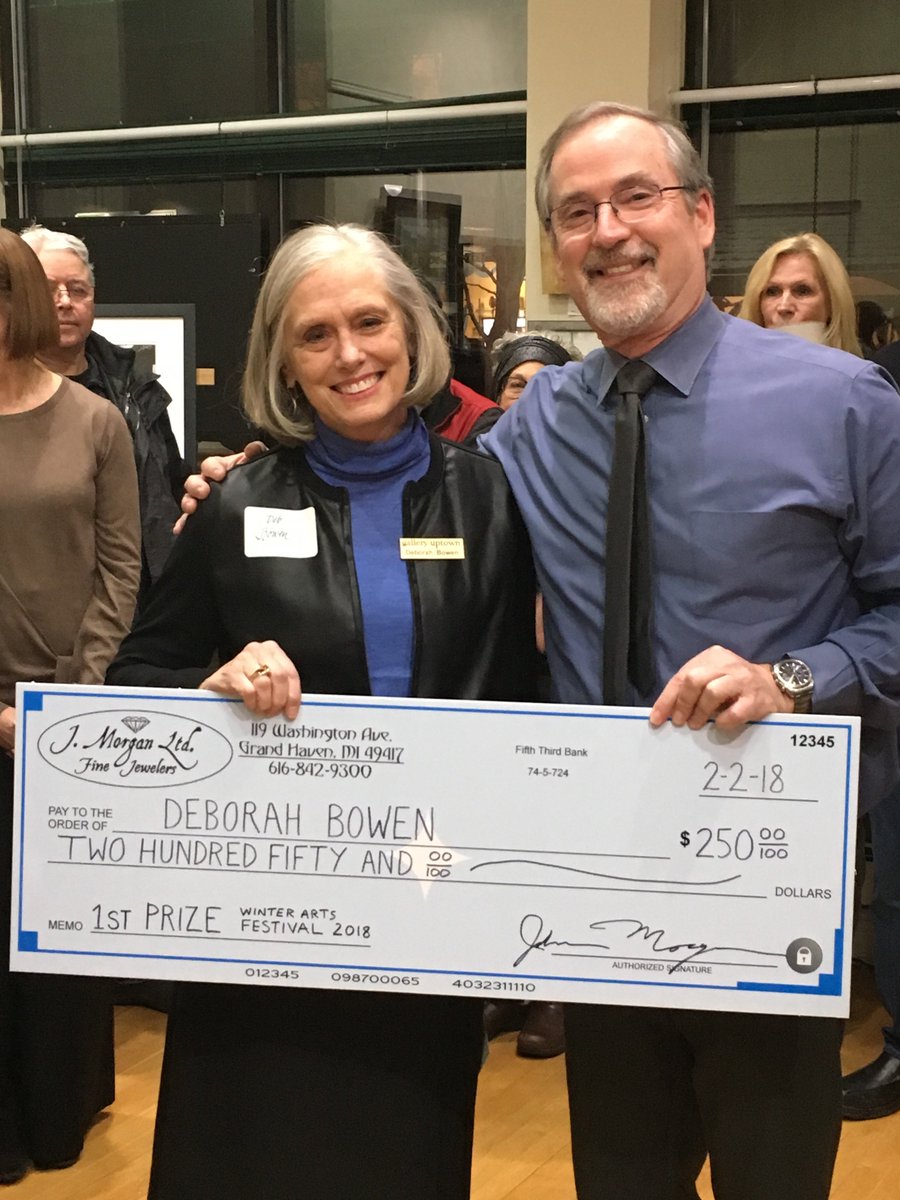 Jmorganltd's tweet photo. J.MorganLtd. Owner John Morgan awarding sponsored First Place art prize to Uptown Gallery Winter Festival winner Deborah Bowen. Congrats Deborah! https://t.co/7ROmgFI989