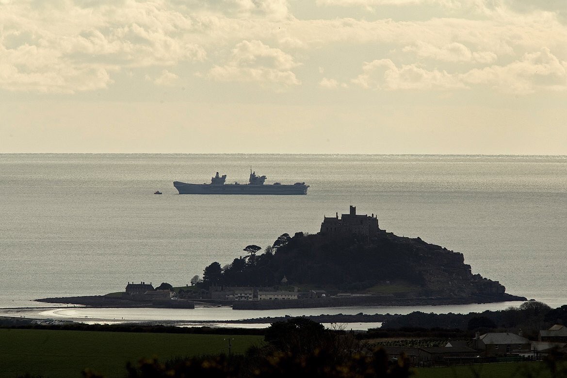 In the foreground is St Michael’s Mount and behind it is our ship. To the left of the bow is the Penlee Lifeboat