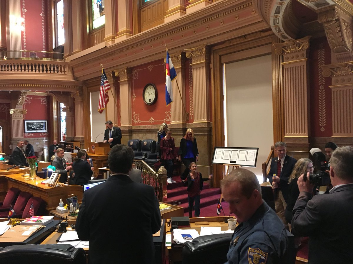 DCSOTraffic's tweet photo. At the Colorado Senate today. #codydonahue family was recognized. His daughters led the pledge and they received a very special copy of the #moveoverforcody law that they worked so hard to get. Honored to represent @dcsheriff. Thank you Senator Holbert!! https://t.co/SvkF7XmDnP