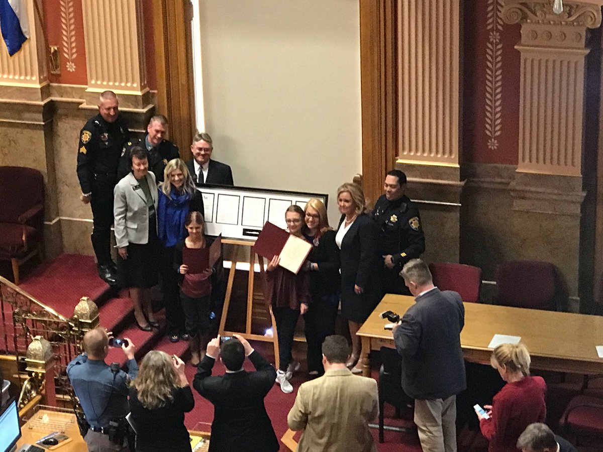 DCSOTraffic's tweet photo. At the Colorado Senate today. #codydonahue family was recognized. His daughters led the pledge and they received a very special copy of the #moveoverforcody law that they worked so hard to get. Honored to represent @dcsheriff. Thank you Senator Holbert!! https://t.co/SvkF7XmDnP