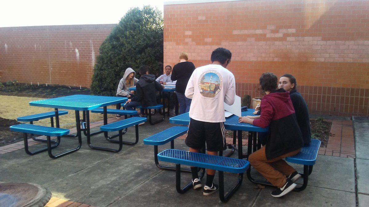 ncseatech's tweet photo. Outside space not just for eating.  Its a classroom too.  It's February and we are teaching math concepts outside.  #southeasternnc @edieskip https://t.co/kVvNs2FgAG