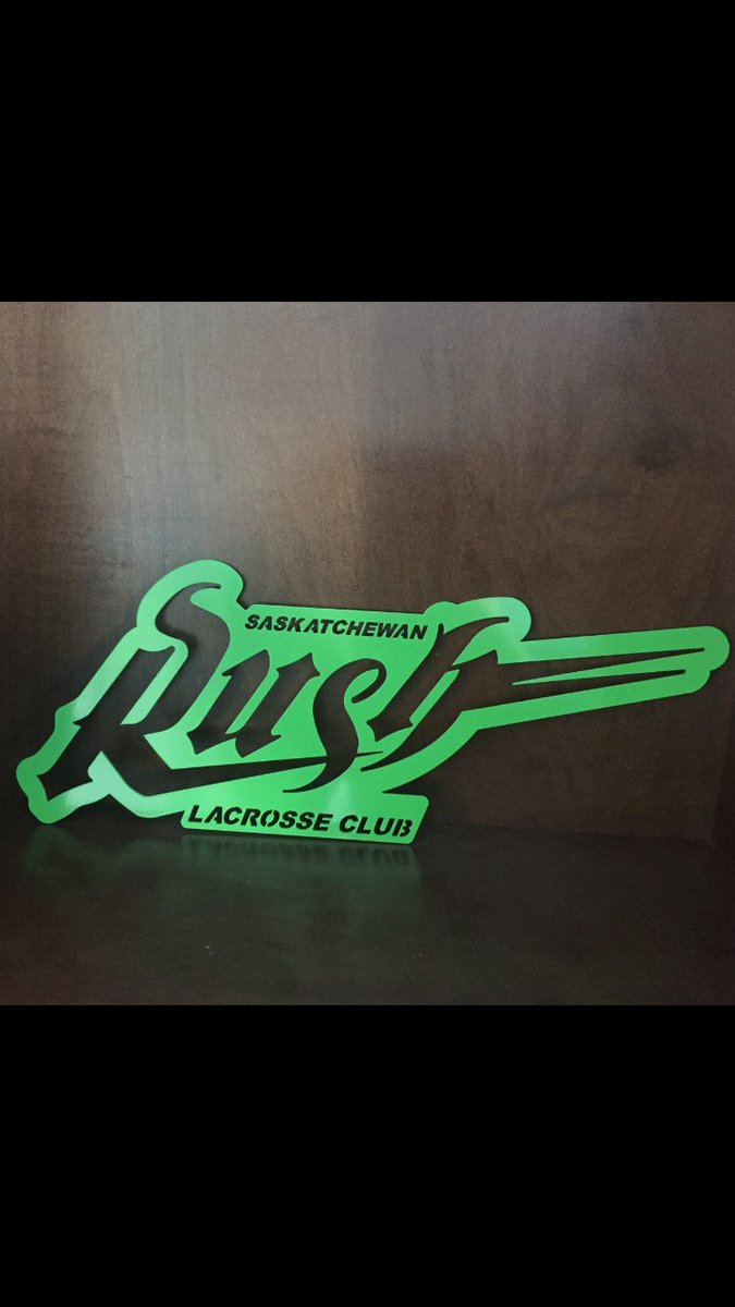 PatrickKurtz11's tweet photo. OMG just got my @SaskRushLAX sign! Wife will likely be mad when she sees that I took some of her knickknacks down to display this. Thanks RJ!! #RushNation #BuildaTradition #Rush https://t.co/NqKsvgbDQR
